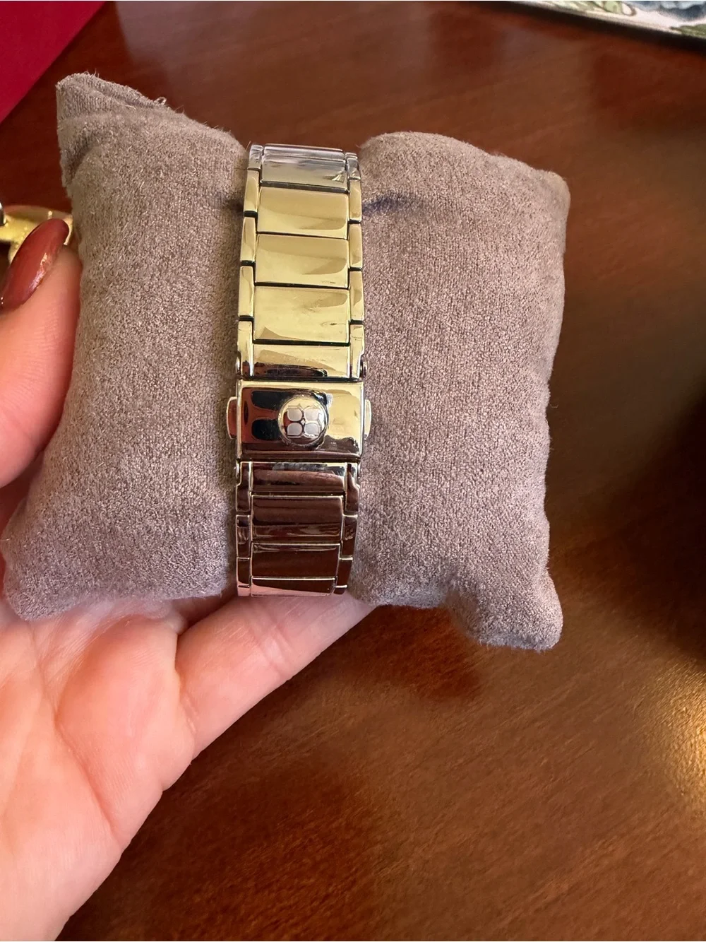 BCBGMAXAZRIA silver watch with diamond accents. Needs battery.
